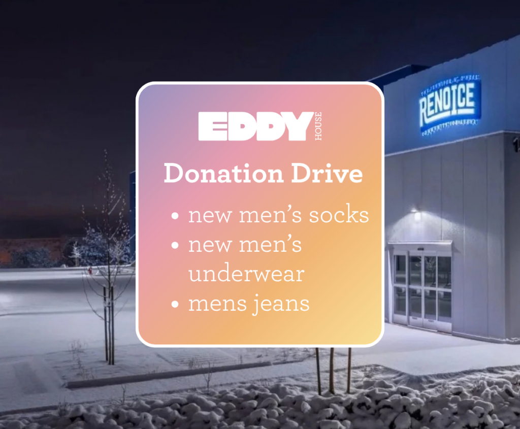 Exterior of Reno Ice at night with snow on the ground. An Eddy House graphic in the foreground reads “Donation Drive” and lists new men’s socks, underwear, and jeans.